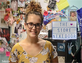 Student at The Store Next Door at Lewiston High School